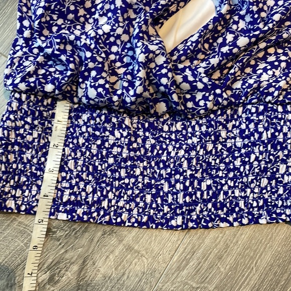 Faux wrap top with a snap closure & smocked at the  waist. - Picture 5 of 7